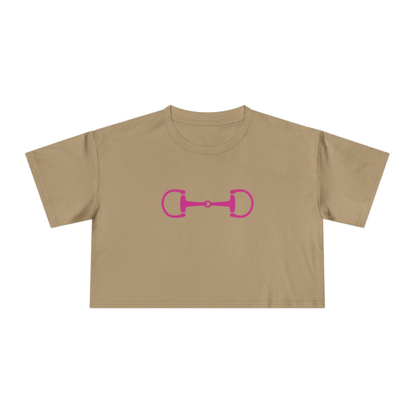 Beige cropped tee with pink horsebit graphic, relaxed fit, and modern equestrian style.