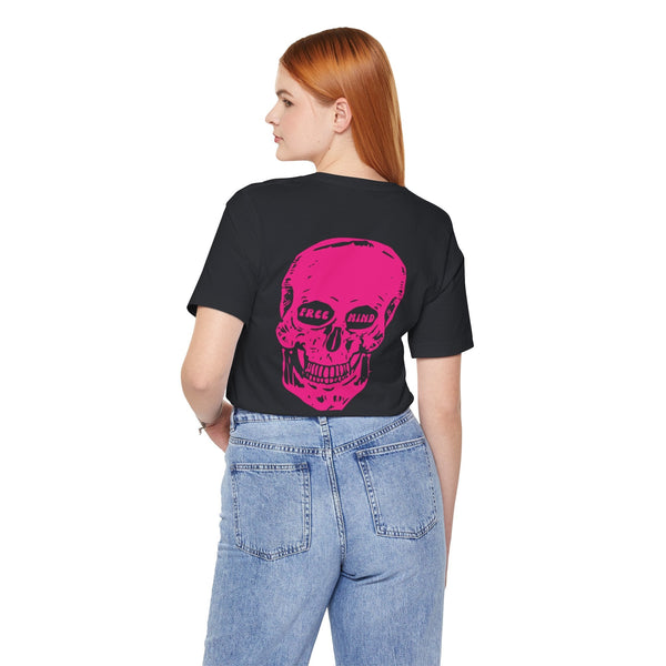 Woman wearing black statement streetwear t-shirt with large pink skull back print and "FREE MIND" eye detail paired with blue jeans