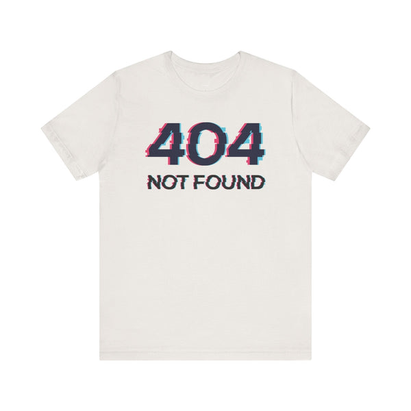 White unisex short sleeve tee with glitchy "404 NOT FOUND" graphic text on the front.