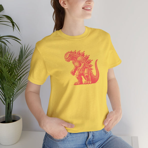 Yellow kaiju t shirt featuring a red Godzilla graphic worn by a smiling woman with hands in pockets.