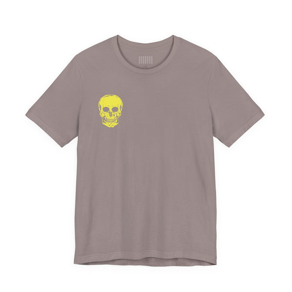 Unisex underground style taupe t-shirt with small yellow skull print on front and jumbo skull graphic on back