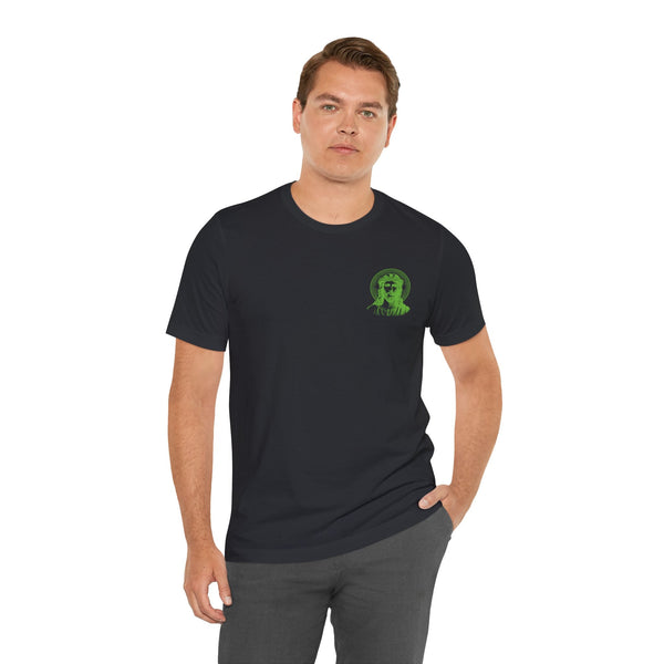 Man wearing black tee with small green Jesus graphic and halo on left chest front
