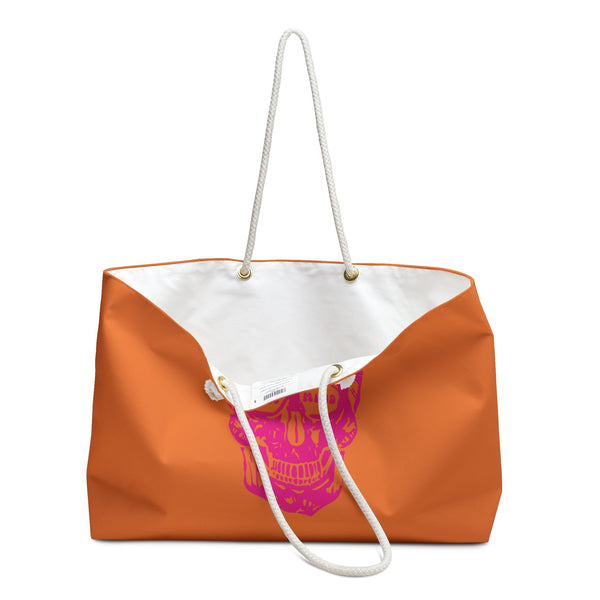 Orange weekender skull bag with pink "LIVE FREE" skull graphic and white rope handles