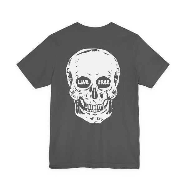 Dark gray streetwear graphic tee with a large white skull print on the back featuring "Live Free" text in the eye sockets.