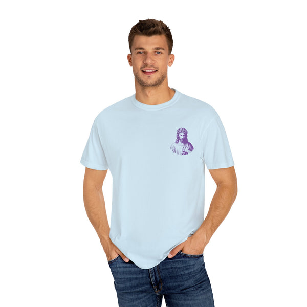 Man wearing light blue unisex t-shirt with small purple Jesus graphic on left chest, Christian streetwear style