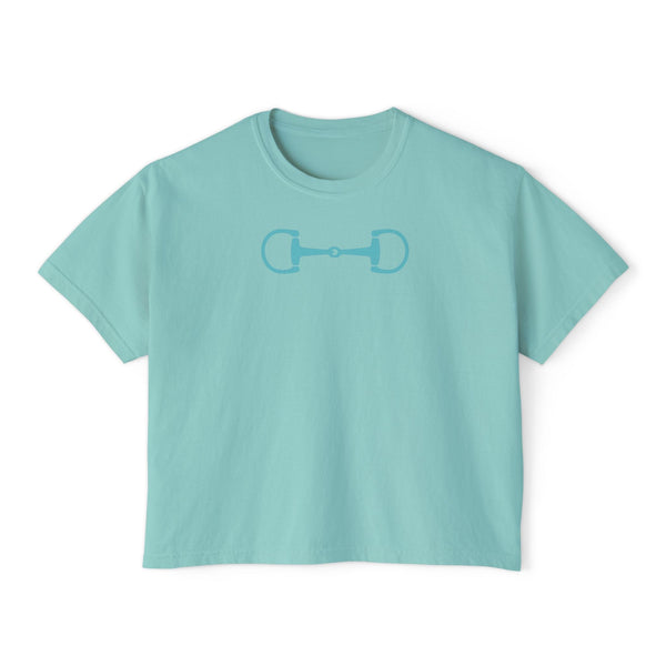 Aqua blue boxy tee shirt with a minimalist horsebit graphic, made from soft breathable cotton, modern equestrian streetwear style.