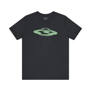 Black unisex t-shirt featuring a celadon green retro flying saucer space ship graphic with beam rays