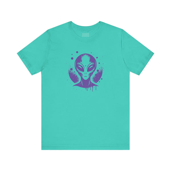 Teal streetwear alien t shirt featuring a purple graphic of an alien head with a spray-paint style design.