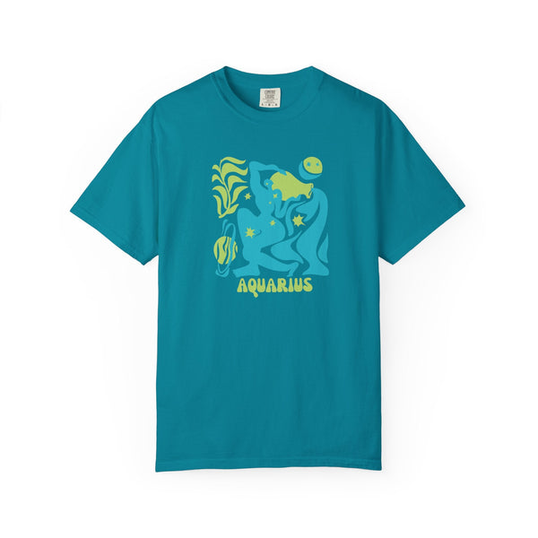 Aquarius zodiac graphic tee in aqua blue with green celestial design and water-bearer motif.