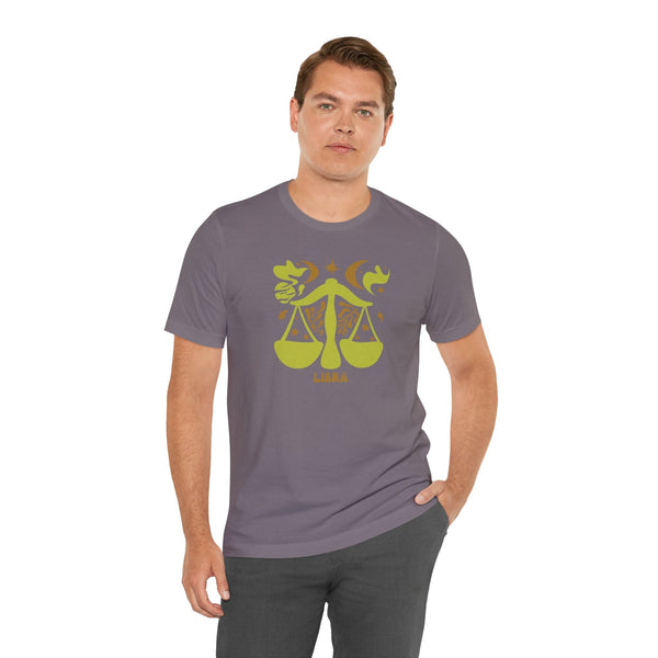 Man wearing a gray unisex Libra t shirt with yellow artistic zodiac balance scales design on front