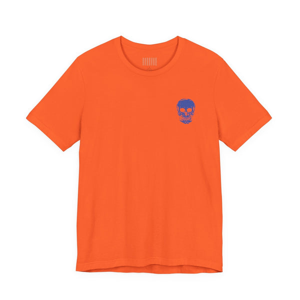 Orange graphic tee shirt with small blue skull on front left side