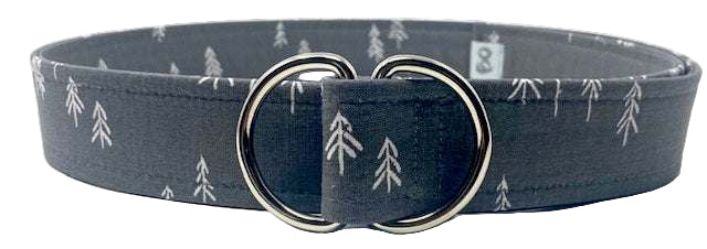 Outdoor fashion belt by Oliver Green featuring grey cotton fabric with subtle tree motif and polished D-ring buckle-inspired tree pattern fabric belt with metal D-ring buckle, 1.5 inches wide and 41.5 inches long.