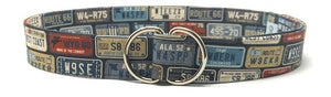 Travel-inspired durable belt featuring vintage license plate design and double ring buckle, 1.5 inches wide and 41.5 inches long.
