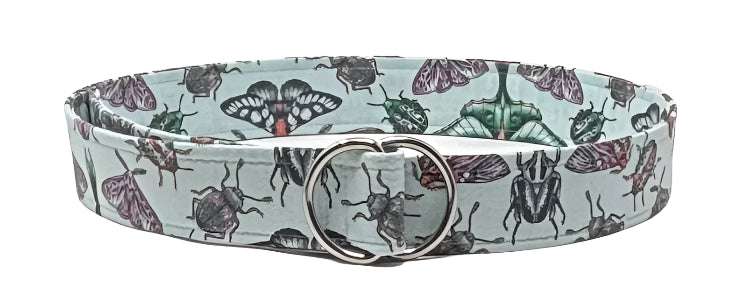 Aqua Moth Beetle D-ring belt with insect print on soft aqua fabric, adjustable and lightweight accessory.