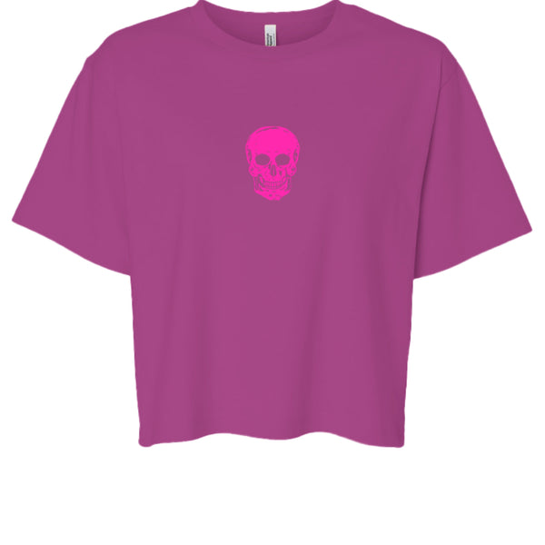 Hot pink boxy tee with minimalist skull graphic centered on chest, streetwear style