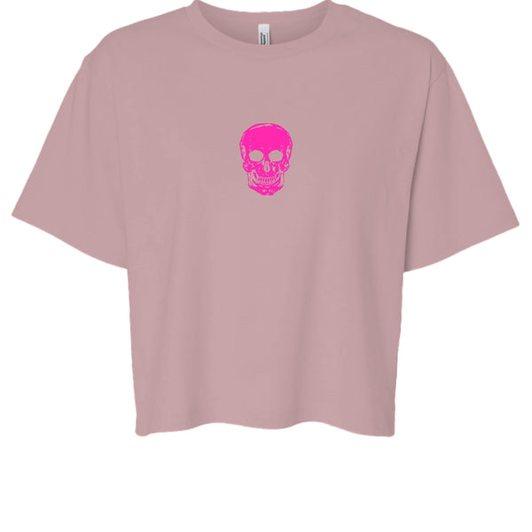 Hot pink skull graphic on a boxy hot pink streetwear tee with minimalist design