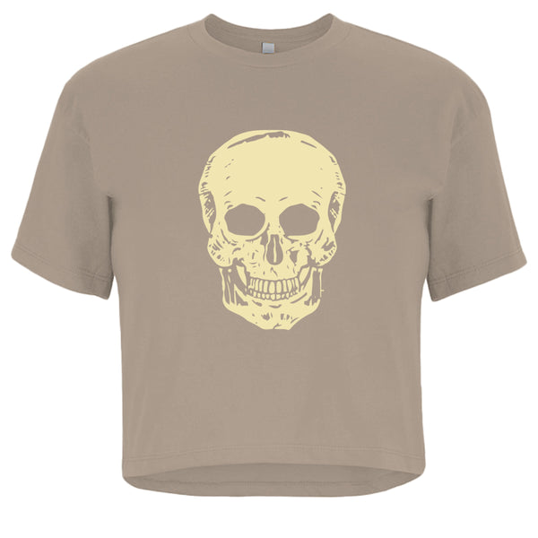 Women’s cropped cream tee with oversized cream skull graphic and boxy streetwear fit