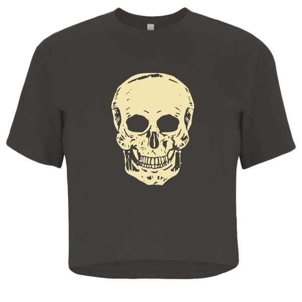Women's cropped black tee with oversized cream skull graphic on front, edgy streetwear style