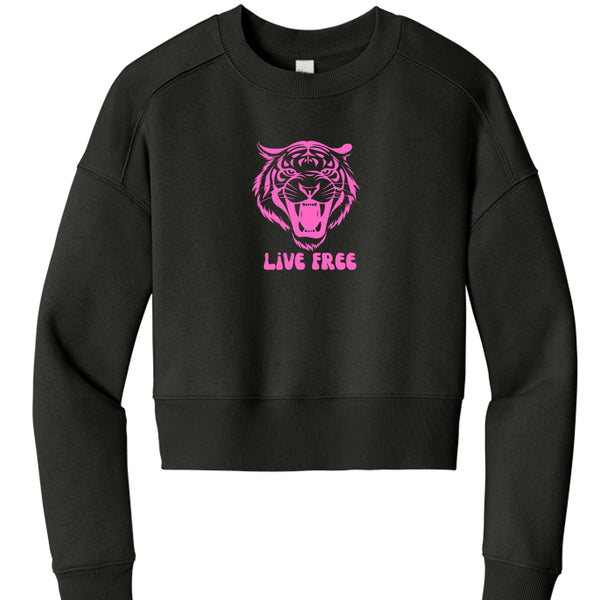Women's black cropped sweatshirt with pink roaring tiger graphic and "Live Free" slogan on front