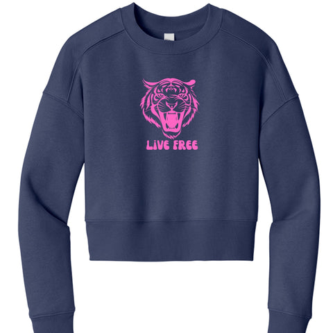 Women's cropped navy sweatshirt with pink roaring tiger graphic and "Live Free" slogan