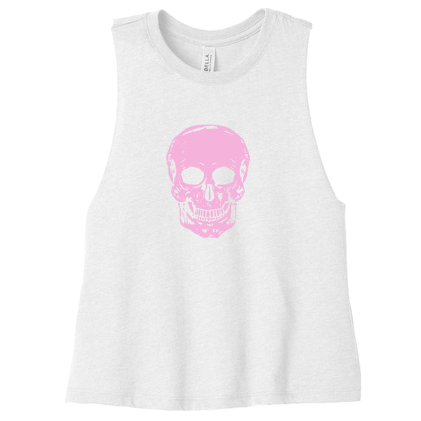 White women's cropped tank top with raw-edge armholes featuring a bold pink skull graphic at the center