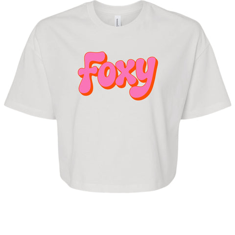 Vintage 70s cropped white tee with bold pink and orange Foxy graphic text