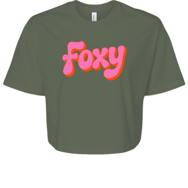 Vintage 70s women's cropped tee with bold pink and orange Foxy graphic on soft olive fabric