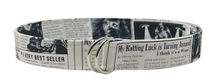Zombie belt with newspaper print design featuring horror-themed text and imagery, 1.5 inches wide and 42.5 inches long.