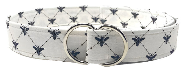 Bee print black and white belt by Oliver Green featuring cotton fabric with graphic bee motifs and polished silver D-ring buckle.