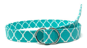 Turquoise trefoil geometric fabric belt with white pattern and dual D-ring adjustable closure